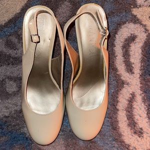 Tan round toe sling back shoes. Great for work